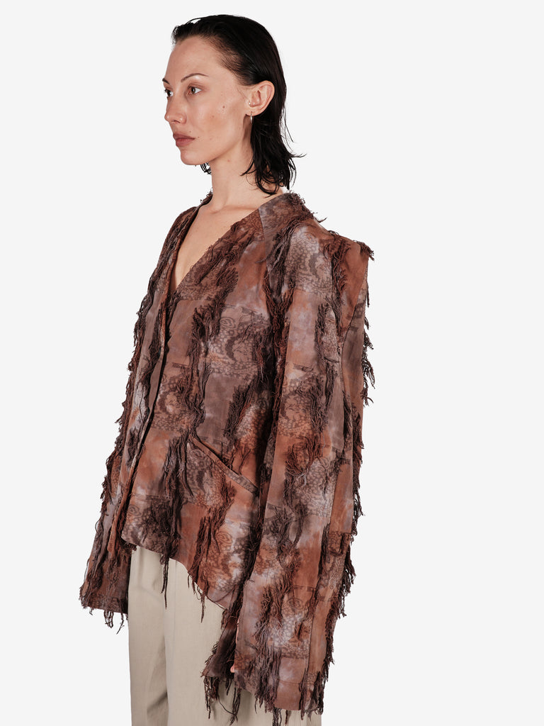 Hand-dyed cotton jacket with fringe and a belt.