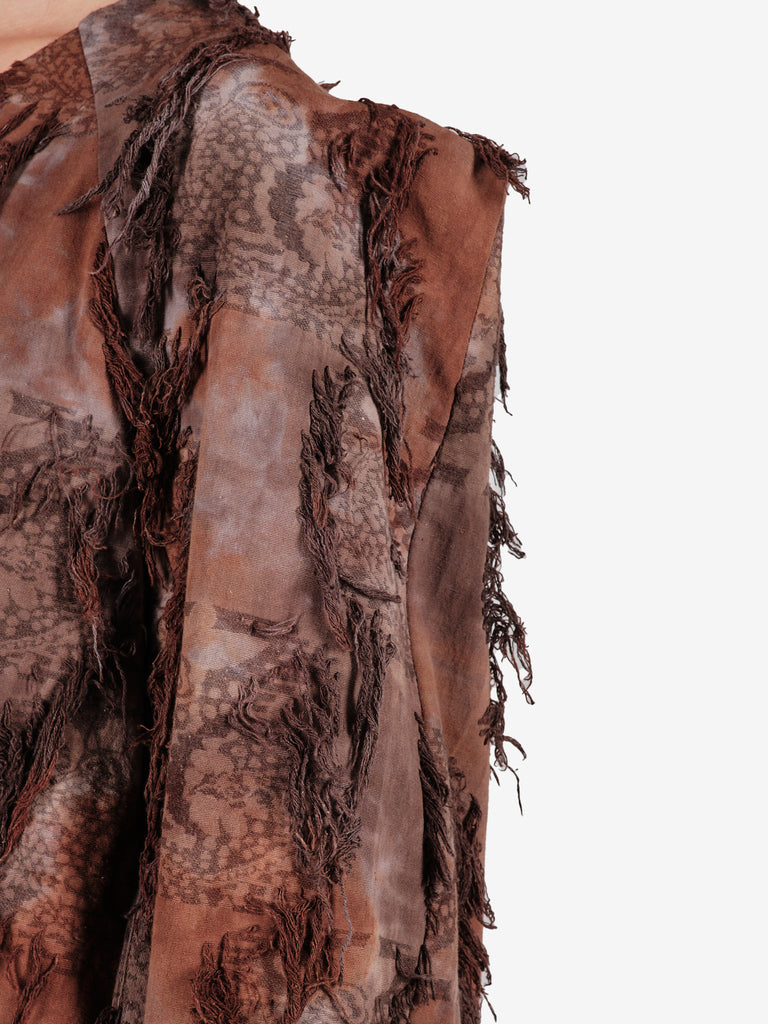 Hand-dyed cotton jacket with fringe and a belt.